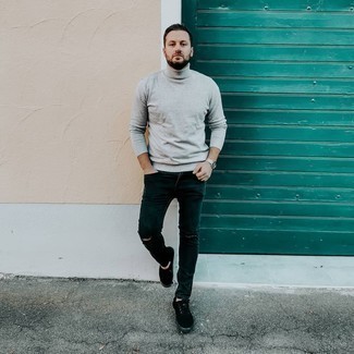 Grey Turtleneck Outfits For Men: We all look for functionality when it comes to style, and this casual combination of a grey turtleneck and black ripped jeans is a practical example of that. Balance out this outfit with a classier kind of shoes, such as this pair of black canvas low top sneakers.