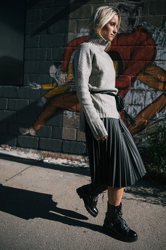 Women's Outfits 2022: This casual pairing of a grey wool turtleneck and a charcoal pleated midi skirt is a goofproof option when you need to look stylish in a flash. Put a more relaxed spin on an otherwise mostly classic look with a pair of black leather lace-up flat boots.