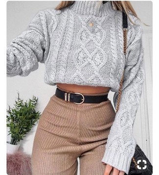 500+ Dressy Outfits For Women: A grey knit turtleneck and tan wool skinny pants are an easy way to inject extra cool into your current collection.