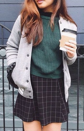 Grey Varsity Jacket Outfits For Women: For an outfit that provides function and style, go for a grey varsity jacket and a black check skater skirt.