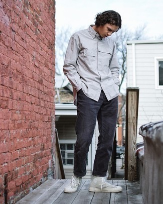 Grey Canvas High Top Sneakers Outfits For Men: A grey vertical striped long sleeve shirt and charcoal corduroy jeans are a nice outfit worth having in your off-duty collection. Go ahead and introduce a pair of grey canvas high top sneakers to this outfit for a more casual finish.