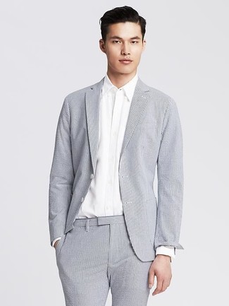 Charcoal Vertical Striped Suit Dressy Warm Weather Outfits: You're looking at the definitive proof that a charcoal vertical striped suit and a white dress shirt are awesome when paired together in a sophisticated ensemble for today's gentleman.