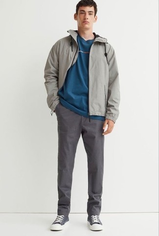 Charcoal Chinos Outfits: Up your relaxed style a notch in a grey windbreaker and charcoal chinos. Does this outfit feel too classic? Introduce a pair of charcoal canvas high top sneakers to switch things up.