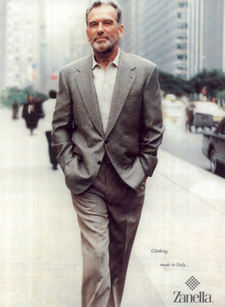 Roy Summersett wearing Grey Wool Blazer, Beige Long Sleeve Shirt, Grey Dress Pants