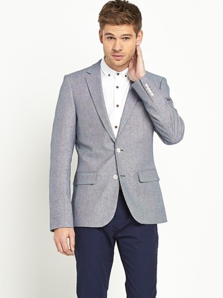 This ensemble with a grey wool blazer and navy chinos isn't hard to put together and easy to adapt.