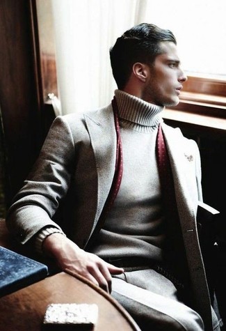 Burgundy Scarf Outfits For Men: A grey wool suit and a burgundy scarf are both versatile menswear essentials that will integrate perfectly within your daily styling lineup.