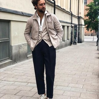 Beige Cardigan Outfits For Men: This polished pairing of a beige cardigan and navy dress pants is a must-try outfit for any man. White leather low top sneakers will add a dash of stylish nonchalance to an otherwise all-too-safe ensemble.