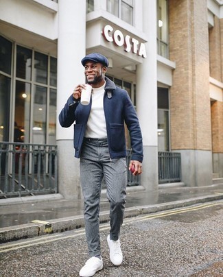Navy Flat Cap Outfits For Men: You'll be amazed at how super easy it is for any man to get dressed like this. Just a navy wool harrington jacket and a navy flat cap. Make this ensemble a bit more elegant by finishing off with white canvas low top sneakers.