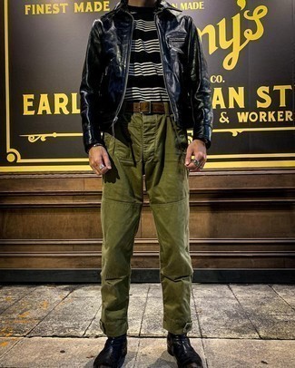 Black Horizontal Striped Crew-neck T-shirt Outfits For Men: Pair a black horizontal striped crew-neck t-shirt with olive chinos for a day-to-day look that's full of charm and personality. Clueless about how to complete this look? Finish with black leather chelsea boots to spruce it up.