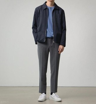 Charcoal Chinos Outfits: This pairing of a black harrington jacket and charcoal chinos is hard proof that a safe off-duty outfit can still be really interesting. Introduce a mellow feel to by slipping into white canvas low top sneakers.