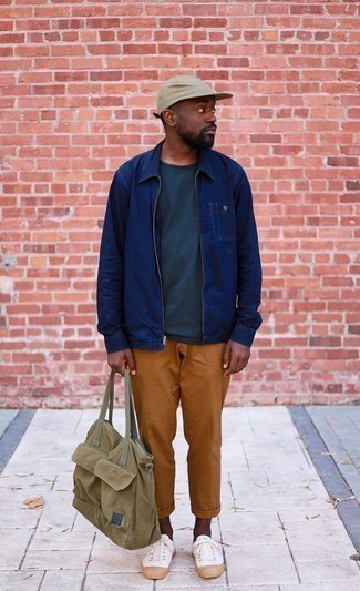 Tan Canvas Tote Bag Outfits For Men: This combo of a navy harrington jacket and a tan canvas tote bag is a safe and very stylish bet. Introduce a pair of white canvas low top sneakers to your outfit to easily boost the fashion factor of any outfit.