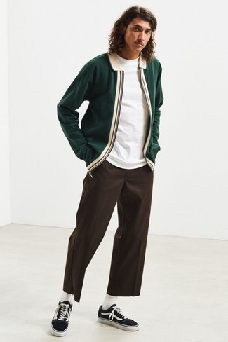 Dark Brown Chinos Outfits: This off-duty pairing of a dark green harrington jacket and dark brown chinos is a tested option when you need to look good but have zero time to spare. A pair of black and white canvas low top sneakers will add a new depth to your getup.