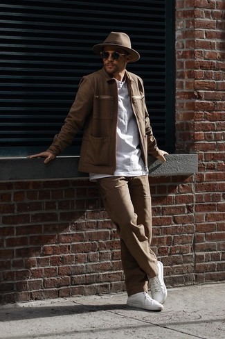 Brown Harrington Jacket Outfits: This relaxed pairing of a brown harrington jacket and brown chinos is very easy to pull together in next to no time, helping you look sharp and prepared for anything without spending a ton of time rummaging through your closet. Finishing off with a pair of white leather low top sneakers is an effortless way to inject a sense of stylish nonchalance into this ensemble.