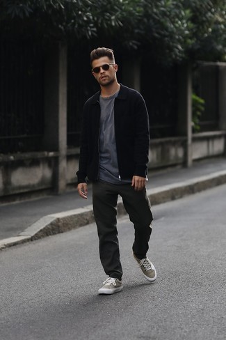 Black Harrington Jacket Outfits: Reach for a black harrington jacket and charcoal chinos if you seek to look casually stylish without putting in too much time. For something more on the daring side to finish your look, add a pair of tan canvas low top sneakers to the mix.