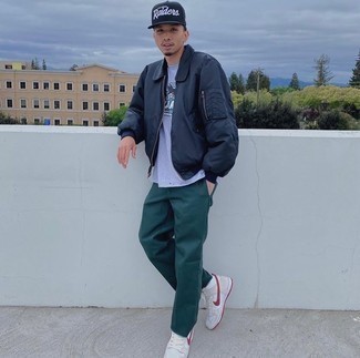 Navy Harrington Jacket Outfits: Wear a navy harrington jacket and dark green chinos if you seek to look laid-back and cool without making too much effort. Finishing with a pair of beige leather high top sneakers is an effective way to bring an easy-going touch to this outfit.