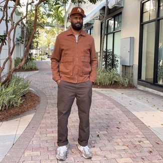 Brown Baseball Cap Outfits For Men: You'll be surprised at how easy it is for any gent to pull together a street style ensemble like this. Just a tobacco harrington jacket and a brown baseball cap. On the shoe front, this ensemble is complemented perfectly with grey athletic shoes.