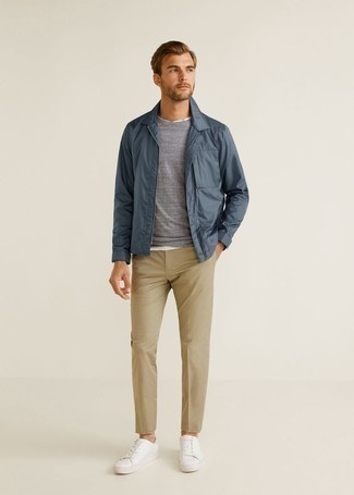 Navy Harrington Jacket Outfits: You're looking at the solid proof that a navy harrington jacket and khaki chinos look awesome when paired together in an off-duty getup. White canvas low top sneakers will contrast beautifully against the rest of the getup.