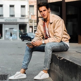 Tan Harrington Jacket Outfits: Want to infuse your closet with some elegant dapperness? Pair a tan harrington jacket with light blue acid wash jeans. White and black canvas low top sneakers integrate well within plenty of combos.