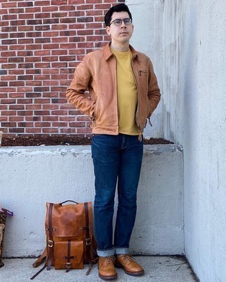Brown Leather Brogues Outfits: To assemble a casual outfit with a modern finish, team a tan leather harrington jacket with navy jeans. Bring an elegant twist to this ensemble by slipping into a pair of brown leather brogues.