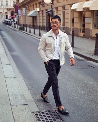 Tan Harrington Jacket Outfits: Extremely dapper, this casual combination of a tan harrington jacket and navy chinos offers amazing styling opportunities. Here's how to class up this outfit: black leather loafers.
