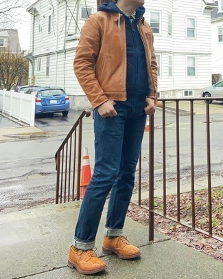 Brown Harrington Jacket Outfits: For a casually dapper getup, marry a brown harrington jacket with navy jeans — these pieces go really good together. Breathe a sense of sophistication into your getup with tobacco leather brogues.