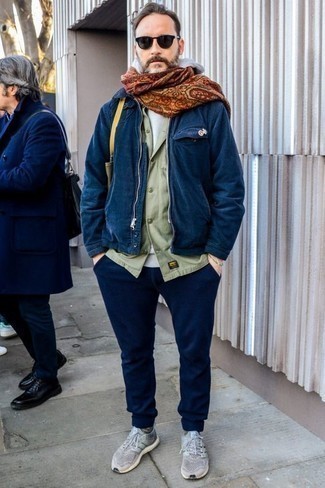 Orange Scarf Outfits For Men: You'll be amazed at how super easy it is for any gentleman to get dressed like this. Just a navy harrington jacket and an orange scarf. Grey athletic shoes integrate seamlessly within a myriad of combinations.