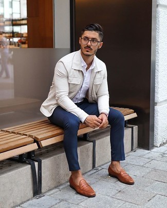 Tobacco Leather Loafers Outfits For Men: Indisputable proof that a beige harrington jacket and navy vertical striped chinos look amazing when combined together in a relaxed look. Tobacco leather loafers are a guaranteed way to give a hint of refinement to your look.