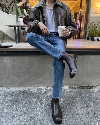 Dark Brown Leather Chelsea Boots Outfits For Men: If the situation permits relaxed dressing, opt for a dark brown leather harrington jacket and blue jeans. Serve a little outfit-mixing magic with a pair of dark brown leather chelsea boots.
