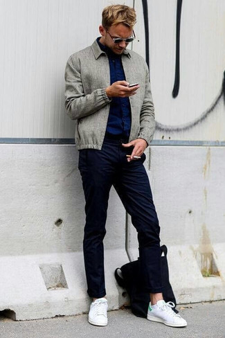Charcoal Harrington Jacket Outfits: This combo of a charcoal harrington jacket and navy chinos is the ultimate casual style for any man. Infuse a mellow vibe into this outfit with white and green leather low top sneakers.
