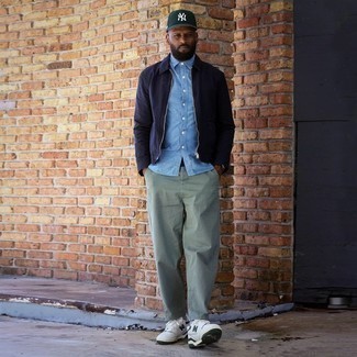 Navy Harrington Jacket Outfits: This off-duty combination of a navy harrington jacket and mint chinos is a tested option when you need to look cool but have zero time to dress up. Complete this ensemble with white and green leather low top sneakers to infuse an air of stylish casualness into this outfit.