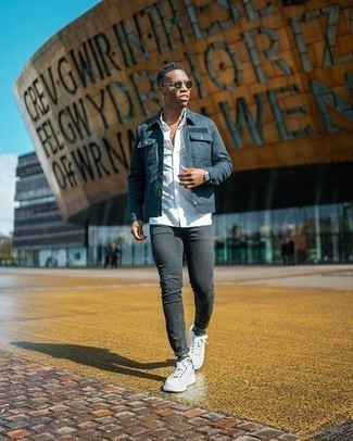 Navy Harrington Jacket Outfits: Flaunt your skills in men's fashion by combining a navy harrington jacket and charcoal skinny jeans for an off-duty look. The whole look comes together perfectly when you complement your getup with a pair of white and black canvas low top sneakers.