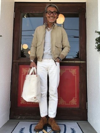 Tan Harrington Jacket Outfits: This laid-back combo of a tan harrington jacket and white jeans can only be described as incredibly stylish. On the footwear front, this getup is finished off perfectly with brown suede desert boots.