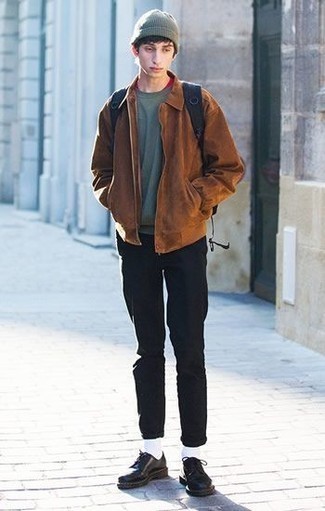 Dark Green Sweatshirt Outfits For Men: This combination of a dark green sweatshirt and black jeans is hard proof that a safe casual look doesn't have to be boring. If you wish to easily step up your outfit with shoes, add a pair of black studded leather derby shoes to this look.