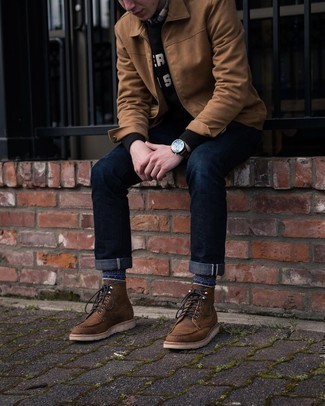 Black Sweatshirt Outfits For Men: Perfect casual look in a black sweatshirt and navy jeans. Brown leather casual boots will infuse an air of polish into an otherwise mostly dressed-down look.