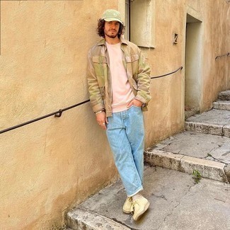 Pink Sweatshirt Outfits For Men: For a laid-back look, consider pairing a pink sweatshirt with light blue jeans — these two pieces work really well together. Don't know how to complete your ensemble? Wear a pair of beige suede desert boots to class it up.