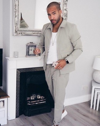 Grey Harrington Jacket Outfits: Go for a straightforward but at the same time cool and casual choice in a grey harrington jacket and grey chinos. Complete your ensemble with a pair of white canvas low top sneakers to avoid looking overdressed.