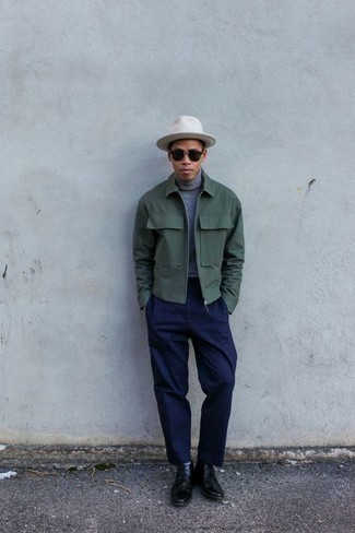 White Bucket Hat Outfits For Men: Go for a straightforward but at the same time laid-back and cool ensemble by pairing a dark green harrington jacket and a white bucket hat. Want to go all out when it comes to footwear? Complement your ensemble with black leather desert boots.