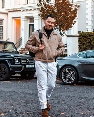 Tan Harrington Jacket Outfits: This combo of a tan harrington jacket and white dress pants can only be described as seriously dapper and elegant. Add a pair of brown suede tassel loafers to the equation and off you go looking boss.