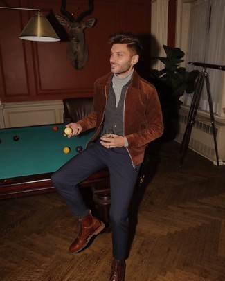 Charcoal Long Sleeve Shirt Outfits For Men: If you would like take your casual fashion game to a new level, pair a charcoal long sleeve shirt with navy vertical striped chinos. Not sure how to round off your ensemble? Finish with a pair of brown leather casual boots to dial it up a notch.