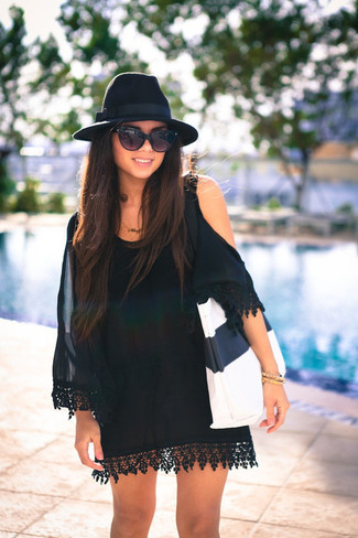 Women's Black Sunglasses, Black Wool Hat, White and Black Leather Tote Bag, Black Silk Off Shoulder Dress