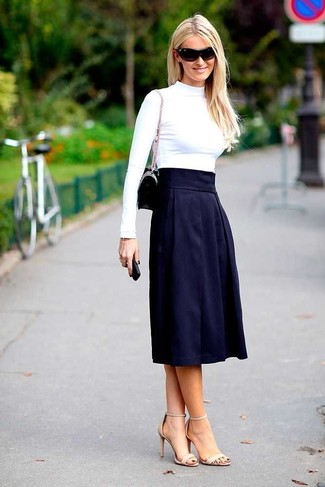 Women's Black Leather Clutch, Beige Leather Heeled Sandals, Navy Pleated Midi Skirt, White Turtleneck