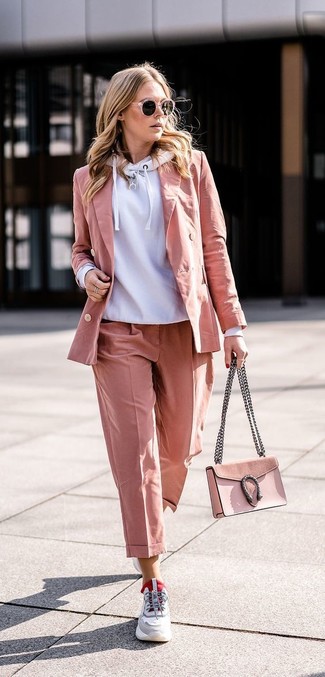 Pink Blazer Outfits For Women: Rock a pink blazer with pink dress pants for an absolutely chic outfit. Grey athletic shoes are a fail-safe way to give a dose of stylish nonchalance to your outfit.