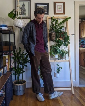 Dark Brown Corduroy Chinos Outfits: A dark purple hoodie and dark brown corduroy chinos are the kind of a winning casual getup that you so awfully need when you have zero time. Add a pair of white canvas low top sneakers to the equation for extra style points.