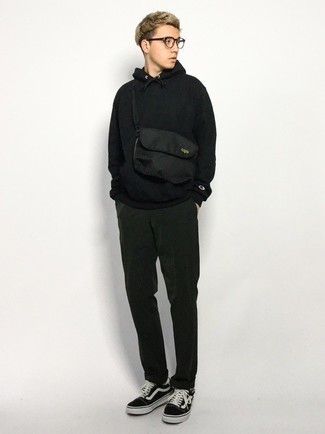 Black Canvas Fanny Pack Outfits For Men: Pair a black hoodie with a black canvas fanny pack if you want to look cool and casual without spending too much time. Complement this outfit with black and white canvas low top sneakers for an added touch of style.