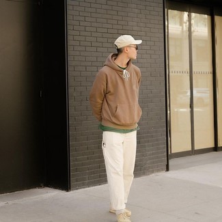 Beige Suede Desert Boots Outfits: Pair a brown hoodie with white chinos to achieve a laid-back and cool look. For a truly modern hi/low mix, add beige suede desert boots to the equation.