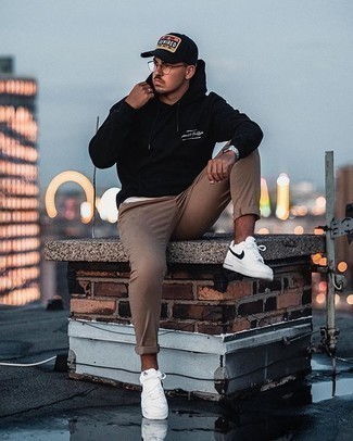 Black and White Print Baseball Cap Outfits For Men: For a casual look, go for a black print hoodie and a black and white print baseball cap — these pieces play beautifully together. Infuse a hint of polish into this getup by wearing white and black canvas low top sneakers.