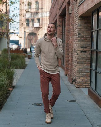 Tan Hoodie Outfits For Men: If you like a more casual approach to dressing up, why not consider wearing a tan hoodie and brown chinos? For a more relaxed spin, why not complement this look with a pair of beige canvas high top sneakers?