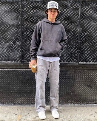White Print Baseball Cap Outfits For Men: A charcoal hoodie and a white print baseball cap are awesome menswear pieces to incorporate into your casual collection. Get a bit experimental in the shoe department and smarten up this outfit by slipping into white canvas low top sneakers.