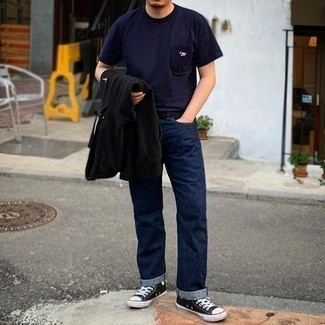 Black Canvas High Top Sneakers Outfits For Men: For a casual and cool ensemble, pair a black hoodie with navy jeans — these pieces go nicely together. Wondering how to finish? Add a pair of black canvas high top sneakers to this ensemble to spice things up.