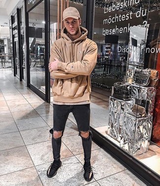 Tan Hoodie with Skinny Jeans Outfits For Men: A tan hoodie and skinny jeans are among the fundamental pieces in any modern gentleman's well-edited casual arsenal. A pair of black athletic shoes is the glue that will bring your ensemble together.